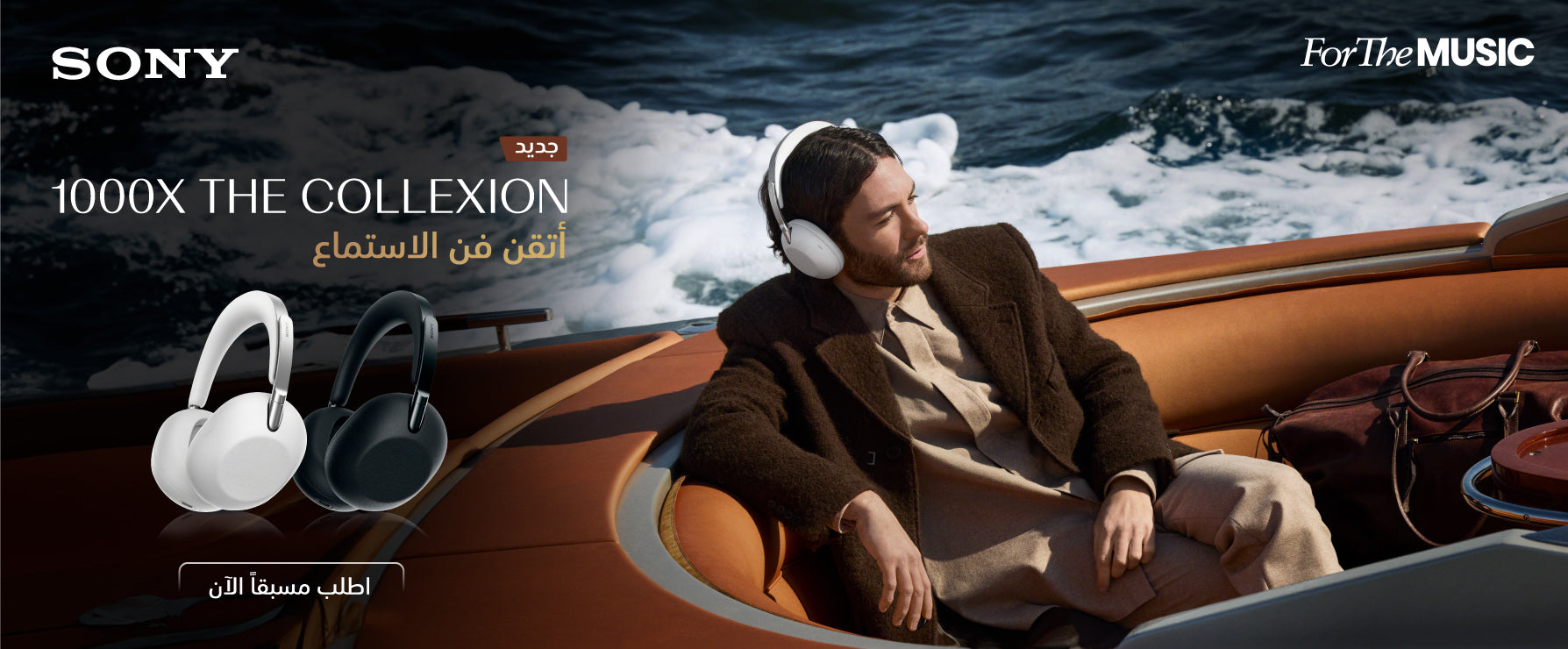 Man sitting on a boat wearing Sony headphones with ocean waves in the background